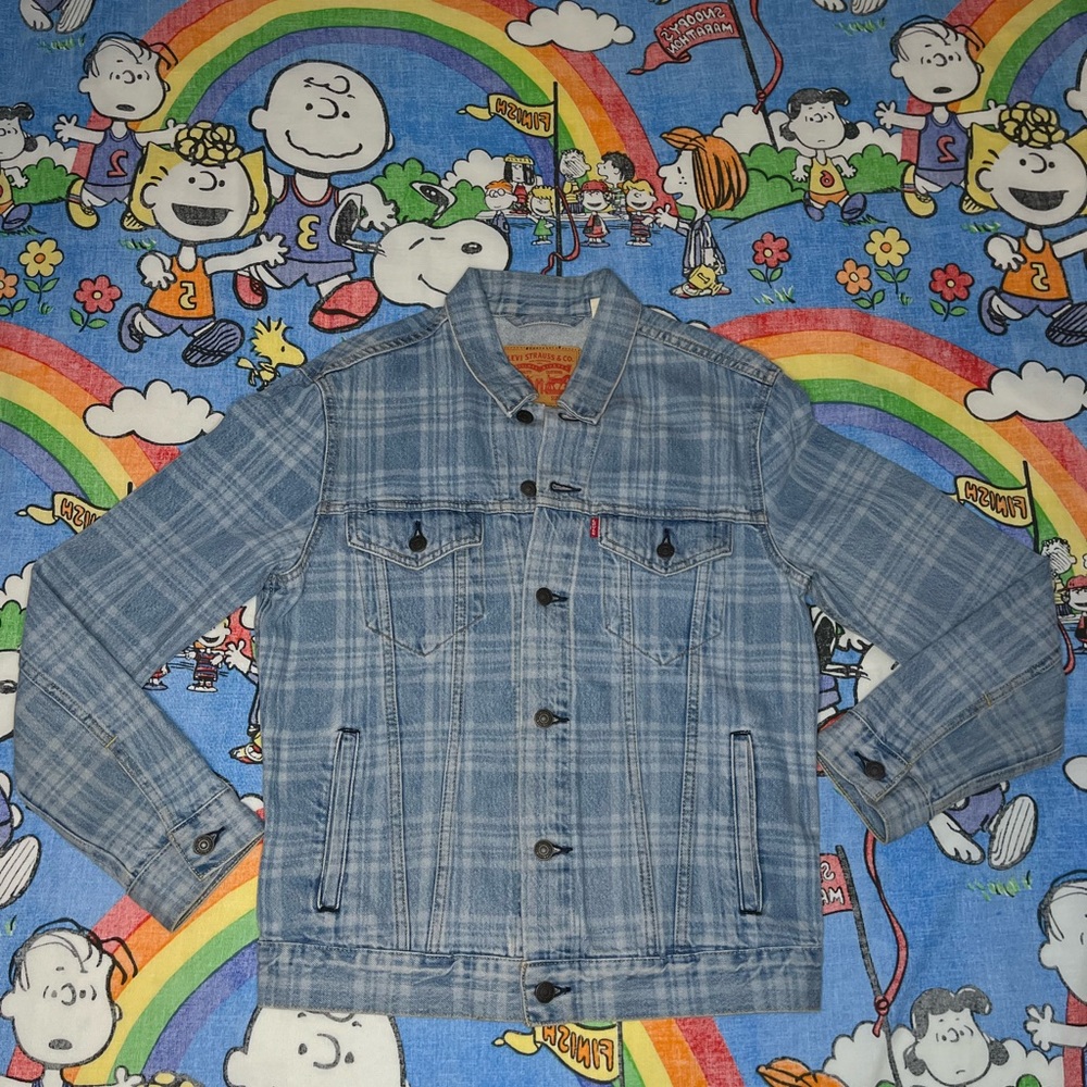 Blue Levi jacket with unique designs